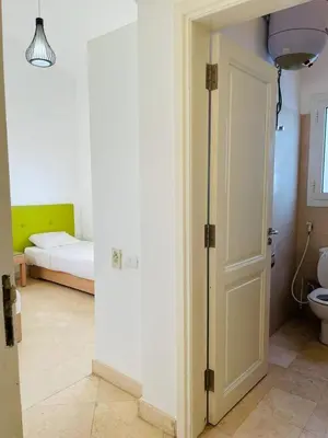 a room with a door leading to a bedroom at 5 bedroom villa with private pool at el gouna in Hurghada