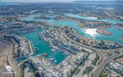 an aerial view of a harbor with boats at Relaxing 3BR Fanadir Marina Home l El Gouna Red Sea l Lagoon Views in Hurghada
