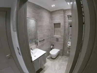 a bathroom with a white toilet and a sink at Dive Hostel Hurghada Beach in Hurghada
