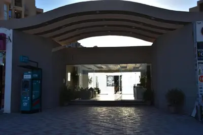 an entrance to a building with an archway at Hurghada Princess resort, Private Sandy Beach & 3 Pools in Hurghada