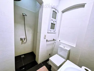 a bathroom with a toilet and a sink at SunShine Y1-0-6 in Hurghada