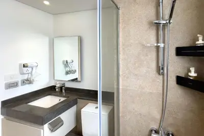 a bathroom with a sink and a shower at Prim & Pleasing 1BDR Kamaran El Gouna in Hurghada