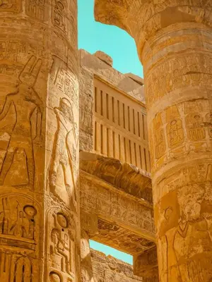 a pillar of a building with reliefs on it at 4 Days Nile Cruise from Luxor to Aswan in Luxor