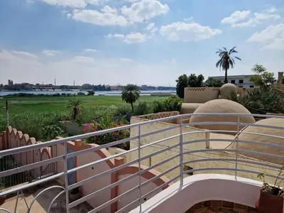 a view from the balcony of a house at Nile House Anis & Do in Luxor