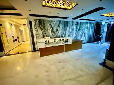 a lobby with a counter in the middle of a building at Juliana Beach in Hurghada