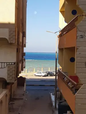 an empty street with a view of the ocean at Dream apartment3 in Hurghada