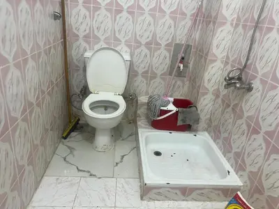 a bathroom with a toilet and a bath tub at Dream apartment3 in Hurghada