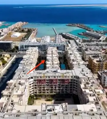 an aerial view of a building with a red spot on it at Florenza01 in Hurghada