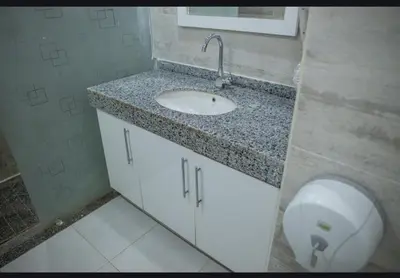 a bathroom with a sink and a toilet at Scandic Hurghada 323 in Hurghada