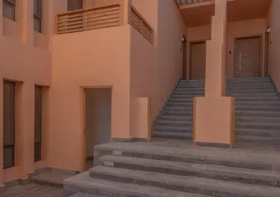 a set of stairs in a building at Ancient Hill 3BR Gouna Sea View & Priv Roof Pool in El Gouna