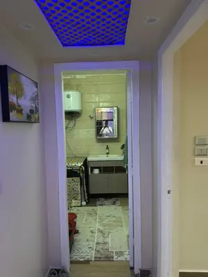 a bathroom with a sink and a blue ceiling at Marsa Alam Port Ghalib in Marsa Alam