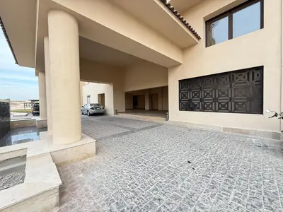 a driveway of a house with a garage at شقه فندقية متكامله 1 غرفه غايه فى الروعه والهدوء hurghada in Hurghada