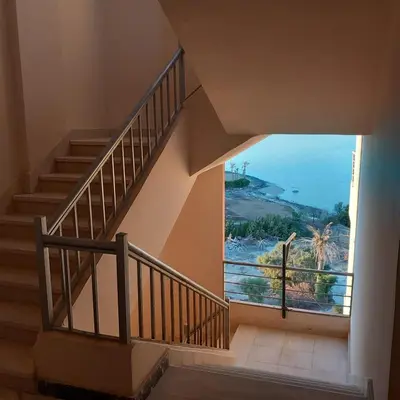 a spiral staircase with a view of the ocean at Villa Shams El Bahr in Hurghada