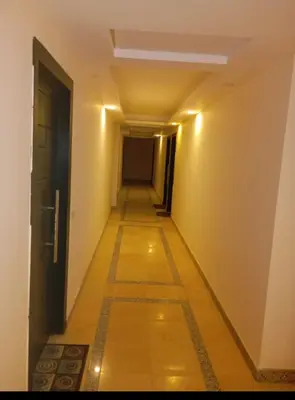 a hallway with a long hallway with a corridorngthngthngthngthngthngthngth at Enter compound in Hurghada
