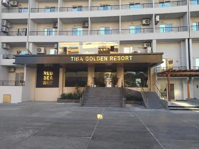 a building with a sign that reads tta golden resort at Tiba Golden Resort apartment 167 in Hurghada