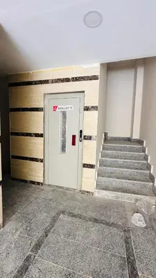 a door in a room with a staircase and a stair case at Hasnaa apartment in Hurghada