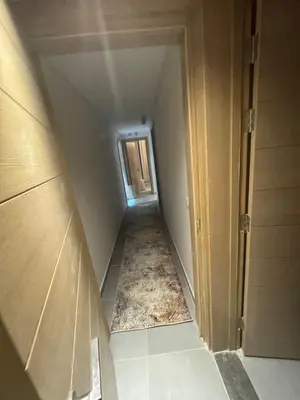 an attic hallway with a hallway leading to a room at luxury apartment Makadi heights phase 2 in Hurghada