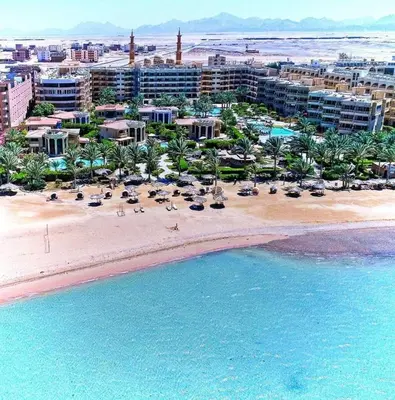 an aerial view of a beach with a resort at Home always in Hurghada