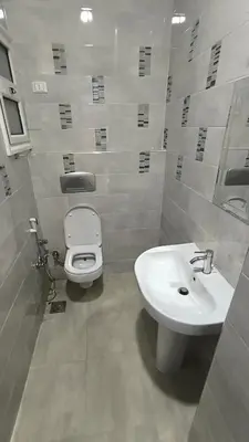 a bathroom with a toilet and a sink at Paradise Hill 207 in Hurghada