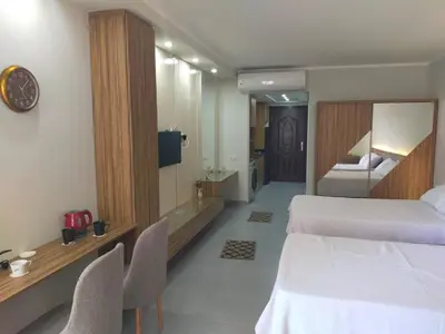 a hotel room with a bed and a bathroom at Scandic resort hurghada in Hurghada