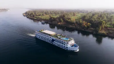 an aerial view of a cruise ship in a river at Renaissance Nile Cruise - Every Saturday from Luxor To Aswan for 4 Nights , and every Wednesday from Aswan To Luxor for 3 Nights in Luxor