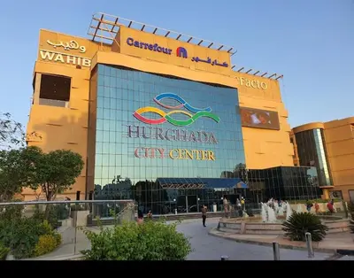 a large building with a sign on the side of it at Hurghada in Hurghada