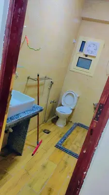 a bathroom with a toilet and a sink at Carrefour Hurghada city centre in Hurghada