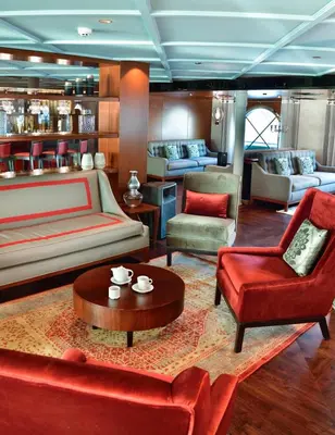 a living room with a couch and chairs and a table at King of The Vally Nile Cruise Aswan To Luxor 3 Night And visit the Nubian village in Aswan