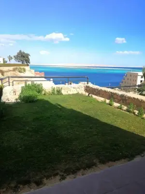 a view of the ocean from the balcony of a house at Sea View Hurghada Holiday Home in Hurghada