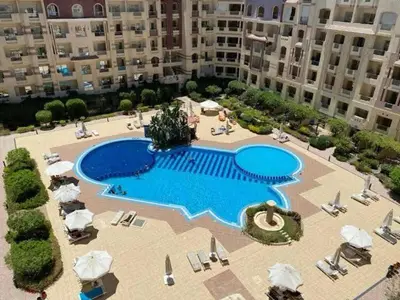 an overhead view of a swimming pool in a building at Florenza Resort in Hurghada