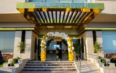 an entrance to a hotel with an arch and balloons at Casablanca Beach for families only in Hurghada
