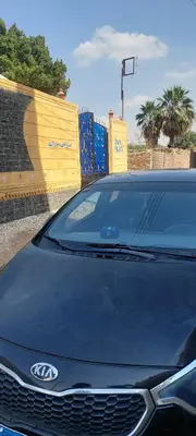 a black car parked next to a basketball hoop at ZAIN PALACe in Jazīrat al ‘Awwāmīyah