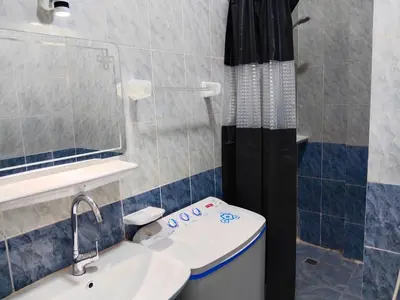 a bathroom with a sink and a toilet and a shower at الغردقه منطقه الاحياء in Hurghada