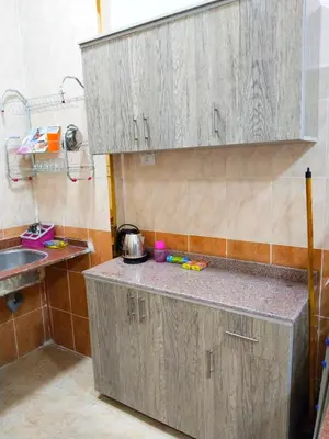 a kitchen with a sink and a counter top at الغردقه منطقه الاحياء in Hurghada