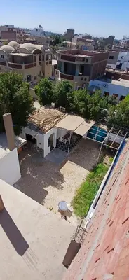 an aerial view of a building in a city at Studio House Luxor in Luxor
