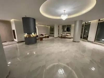 a large room with a lobby with a chandelier at Alhambra Avenue in Hurghada