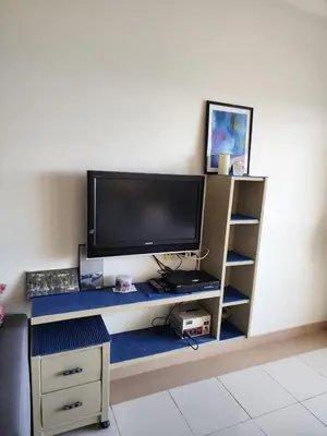 a flat screen tv sitting on top of a shelf at Studio for rent in the view 409 in Hurghada