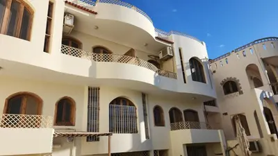 an exterior view of a building with balconies at 2BD Apt, Douplex, 2 floors, Villa Yanny, El Helal, Hurghada in Hurghada