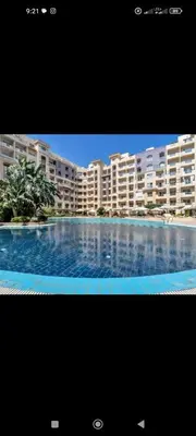 a large swimming pool in front of a large building at Florenze Khamsin Hurghada in Hurghada