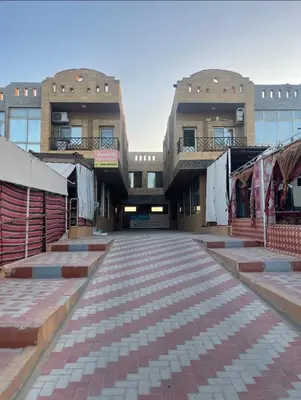 an empty street in front of a building at Sea View Qussier in Quseir