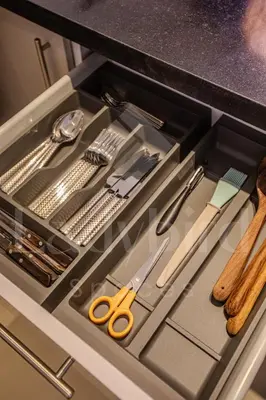 a drawer with scissors and other kitchen utensils at Ladybird - Veranda Celestia in Hurghada