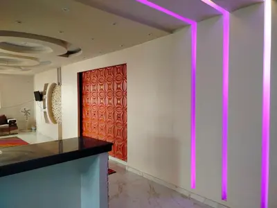 a room with a pink light on the wall at اسوان ـ خلف مول بلازا ـ بجوار فرست مول in Aswān