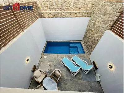 an overhead view of a swimming pool in a building at 3 Bedroom In Bali Heated pool El Gouna in Hurghada