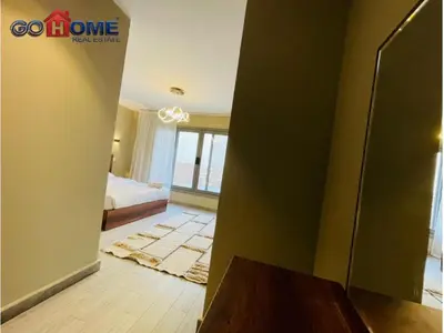 a room with a bedroom with a bed and a window at 3 Bedroom In Bali Heated pool El Gouna in Hurghada