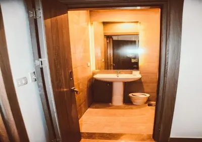 a bathroom with a sink and a toilet at El Gouna 3 Bedroom in Sholan in Hurghada