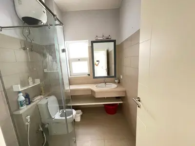 a bathroom with a sink and a toilet and a mirror at lovely 2 bedrooms Groundfloor in Hurghada