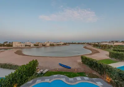 an aerial view of a swimming pool at a resort at 4BR Cyan Dream Villa I Pool Lagoon & Sauna in Hurghada