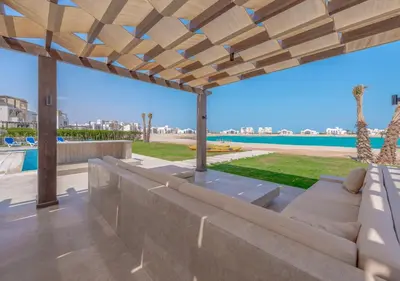 a view of the pool from the patio of a house at Ancient Sands Gouna 4BR Villa Heated Pool & Lagoon in Hurghada