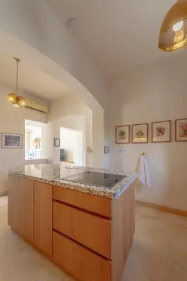 a kitchen with a large island in a room at Dream Beach House on Island 3BR Priv Pool Sabina El Gouna in Hurghada