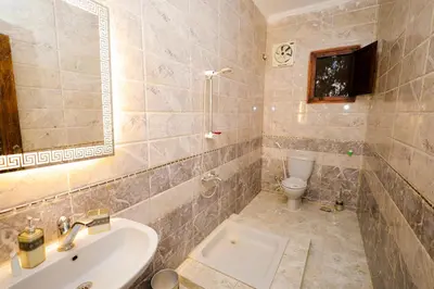 a bathroom with a sink and a toilet at Nile View House in Aswan